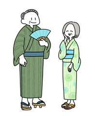 浴衣を着た年配の男女