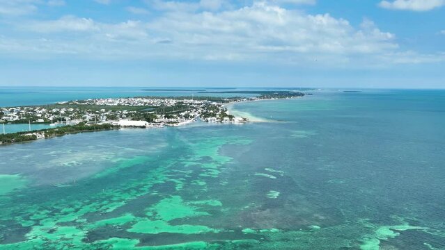 Aerial shot of the Florida Keys and the highway the connects them.