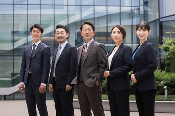 Image of multiple office workers with smiling faces looking up, easy to use in business Asian...