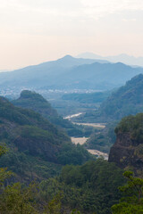 A beautiful picture taken at Wuyishan mountain in China. Nice vie from the high viewpoint on th sunset valley