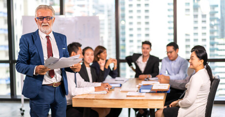 Group of business meeting and discussing strategy with startup project analysis finance process.Success business people plan and brainstorm marketing idea with document in office.Teamwork