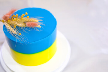 cake in form of Ukrainian flag yellow and blue layer process of making a delicious cake decoration...