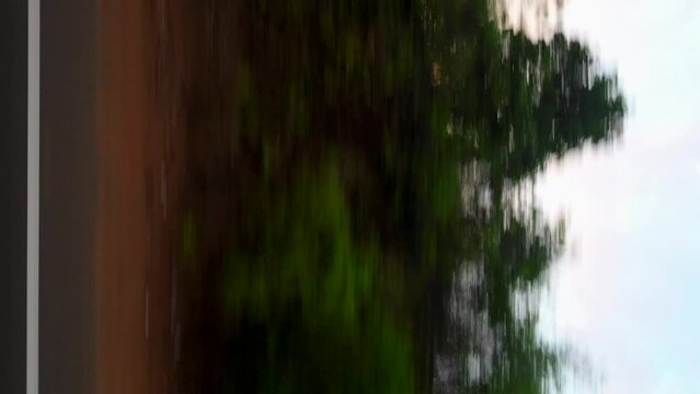 travelling timelaps mumbai to malvan wide view from bus window evening vertical sunset pov city