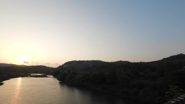 travelling mumbai to malvan wide view from bus window in evening