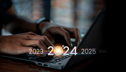 Trend of 2024. people business investor using laptop with virtual 2024 year diagram, business...