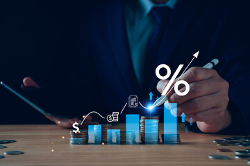 Interest rate and dividend concept. Businessman with percentage symbol and up arrow, Interest rates...