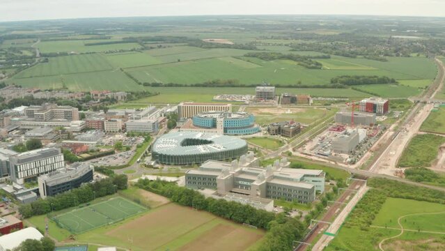 Circling aerial shot over the AstraZeneca building Cambridge