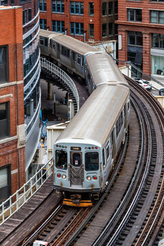 Chicago "L" Elevated Metro rapid rail transit train public transport portrait format in Chicago, United States