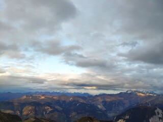 Mountains range with clouds and blue sky