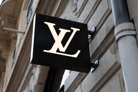 Louis Vuitton Logo Brand and Text Sign Front Wall Facade of Home