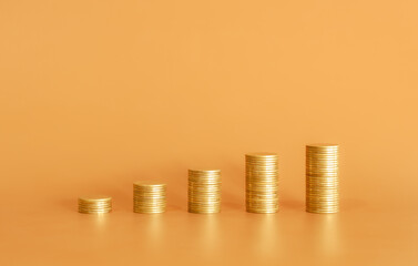 stacks of gold coins on orange background
