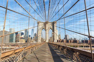 Naklejka na ściany i meble Brooklyn Bridge in New York City skyline of Manhattan with World Trade Center skyscraper in the United States