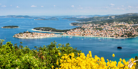 Primosten town on a peninsula vacation in the Mediterranean Sea panorama in Primošten, Croatia - obrazy, fototapety, plakaty
