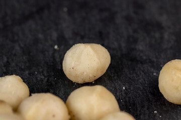 Peeled macadamia nuts on the table