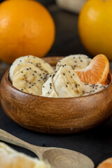 fresh banana-flavored yogurt with banana slices sprinkled with chia