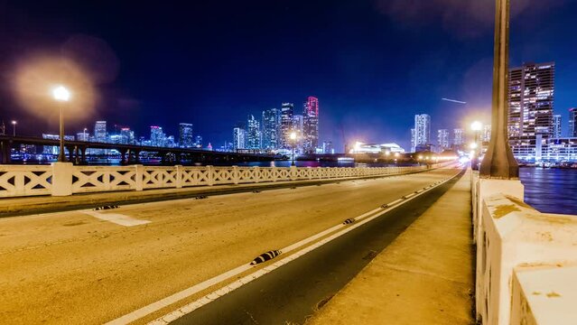 Time Lapse - Traffic on the Bridge of Miami Skyline at Night