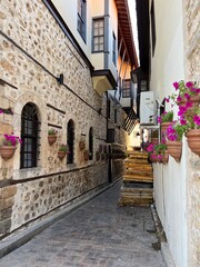Fototapeta na wymiar Picturesque narrow street in the old town of Antalya, Turkey 