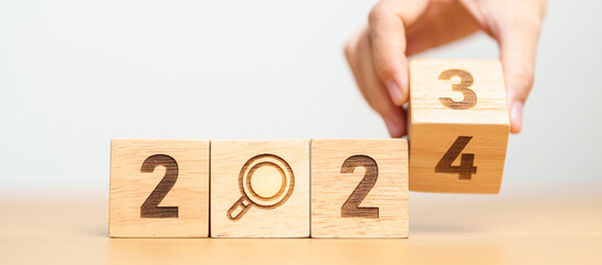 2024 block with magnifying glass icon. SEO, Search Engine Optimization, hiring , Advertising, Idea,...