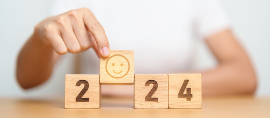 Smile face with 2024 block.  Satisfaction, feedback, Review, mental health, eco sustainable and...