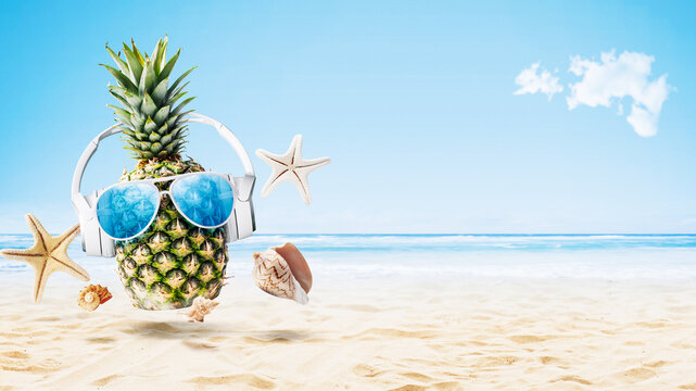Cool pineapple partying at the beach