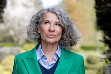 Thoughtful senior woman with gray hair