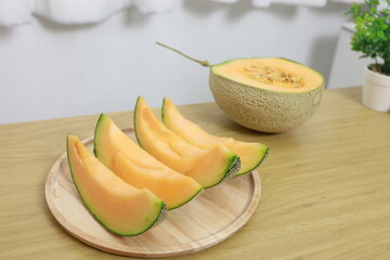 Fruits for healthcare Green Melon wooden table honey melon or cantaloupe