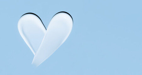 cosmetic smears of creamy texture on blue background