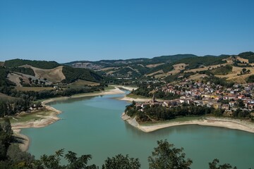 Fototapeta na wymiar Landscape with lake in Sassocorvaro village, Marche region in central Italy