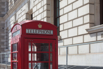 Red telephone box and Big Ben, London. Closeup.