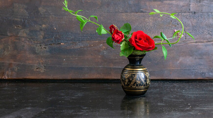 red rose in a vase