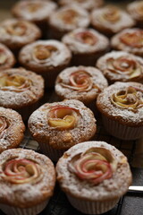 Lots of muffins with apples shallow depth of field
