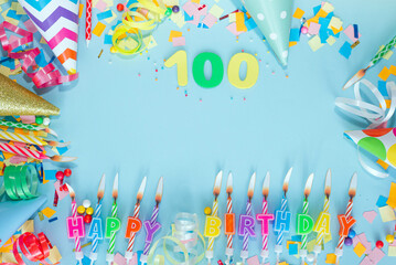 Top view card happy birthday with number  100. Copy space. Postcard holiday anniversary. Happy birthday multicolored background for mensto text, with a numeral with pretty decorations in pastel colors