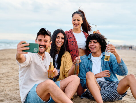 fun beach summer youth friend young woman friendship selfie photo phone smartphone taking mobile camera social smart photograph drink beer vacation
