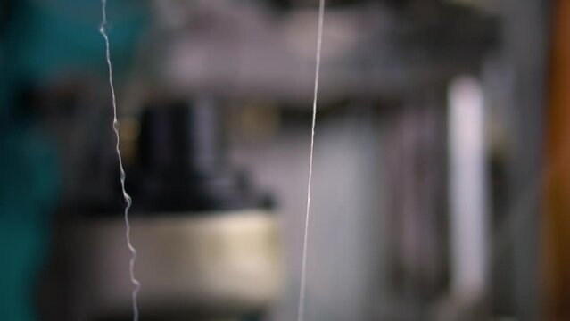 Sock factory work technology - The automatic socks production machine works at high speed. Close-up