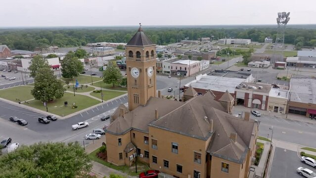 Tuskegee, Alabama downtown and Macon County, Alabama courthouse with drone video moving in a circle.