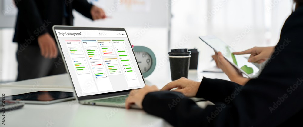 Poster project planning software for modish business project management on the computer screen showing time