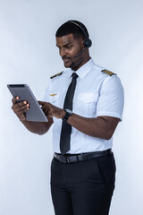 Smiling aircraft pilot. Professional Confident pilot expert. Handsome man wearing airplane pilot...