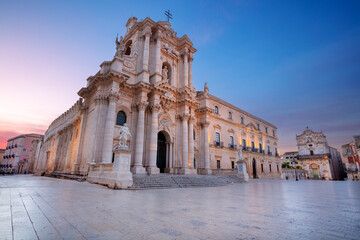 Syracuse, Sicily, Italy. Cityscape image of historical centre of Syracuse, Sicily, Italy with old square and Syracuse Cathedral at sunrise.