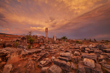 Ruins of ancient Hierapolis Pamukkale at sunset. Turkey