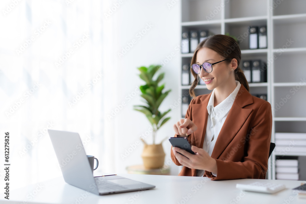 Poster beautiful smiling businesswoman using a smartphone to work on various application including mobile t