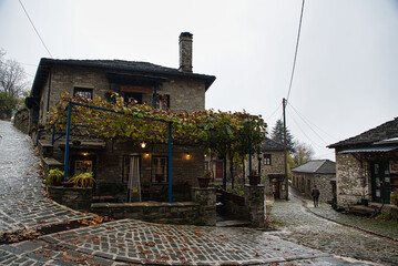 Tsepelovo village, one of the most famous in zagorochoria on a beautiful winter rainy day,...