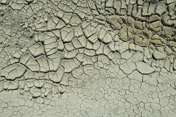 Clay and sand texture of dried soil, close-up.
Dried soil texture on Nallıhan Kız hill. Nallihan Ankara, Türkiye.