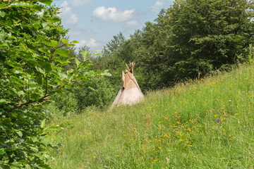 wigwam on a mountain meadow.. © Alla