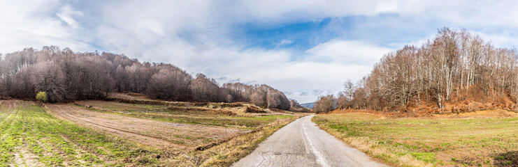 Fototapeta na wymiar Colorful road towards the lake of Aoou on Metsovo. Ioannina, Epirus, Greece
