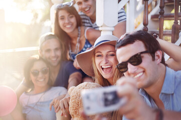 Friends taking selfie outdoors