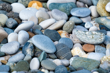 Multi-colored stones on the seashore