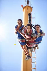 Sheer curtains Amusement parc Portrait smiling friends bungee jumping at amusement park