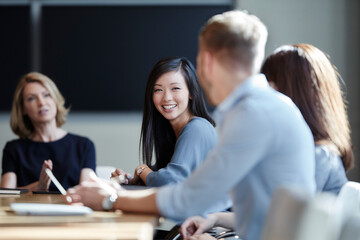 Smiling businesswoman in meeting