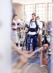 Man with forearm crutches receiving physical therapy