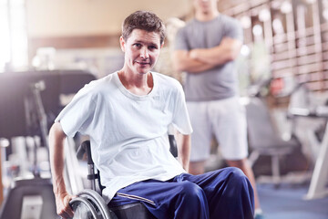 Portrait man in wheelchair at physical therapy